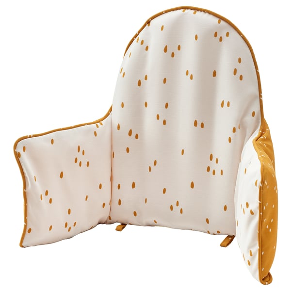 Een ANTILOP opblaasbaar babysteunkussen, wit met oranje stippen, omkeerbaar en ontworpen voor stabiliteit.