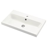 Een witte backsjon waskom met modern ontwerp, rechthoekige vorm en gladde randen, geschikt voor hedendaagse badkamers.