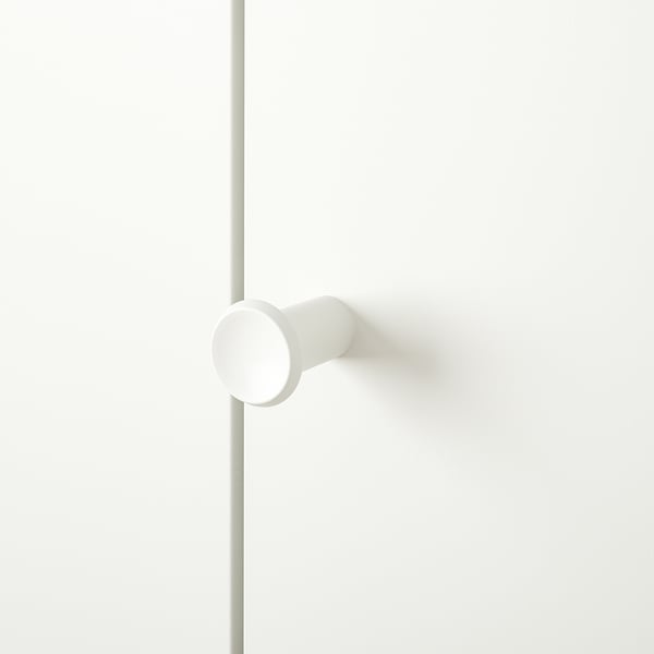 Wit modern handvat op schone deur, minimalistisch ontwerp.