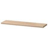 Een ikea BESTÅ verstelbare houten plank. Het is rechthoekig, lichtbruin en gemaakt van spaanplaat met plastic rand.