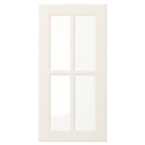 Gebroken witte BODBYN-deur met afgeschuinde panelen, glad gelakt oppervlak en gehard glas - ideaal voor traditionele keukens.