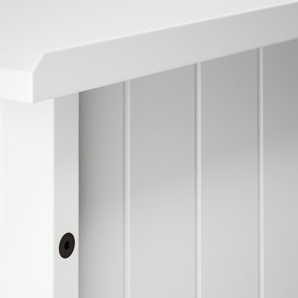 Wit bureaudetail: gladde randen, strakke lijnen, stevige verticale latten.
