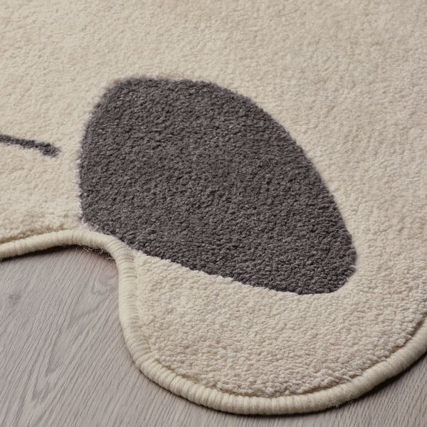 Rond pluche vloerkleed met zachte grijze en witte fleece, hoge kwaliteit, ontworpen voor comfort.