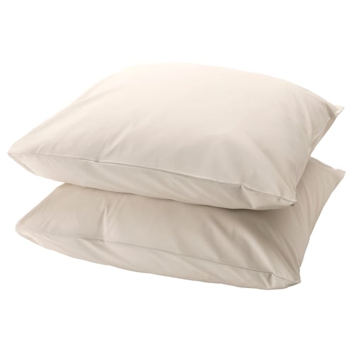 Twee beige katoenen DVALA kussenslopen netjes op elkaar gestapeld.