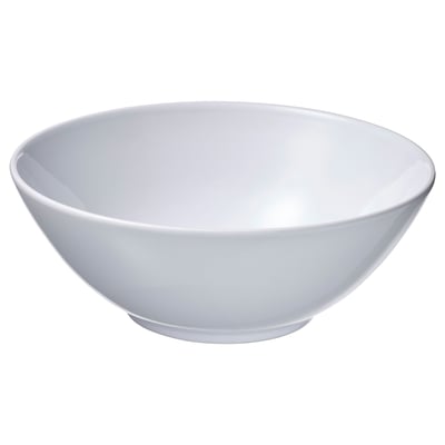 Een witte, ronde en lege GODMIDDAG schaal gemaakt van steengoed, ontworpen voor veelzijdig gebruik.