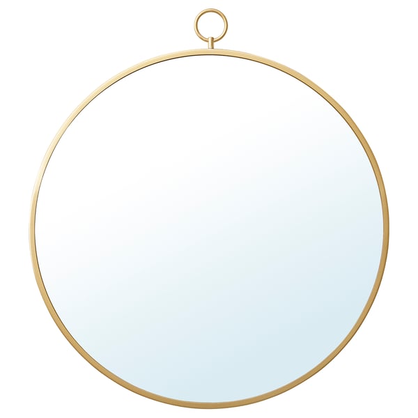 Een ronde, goudkleurige spiegel genaamd GRYTÅS met een messing geplateerde lijst en ophanglus. Het is een modern decoratief stuk dat geschikt is voor muren of tafels.