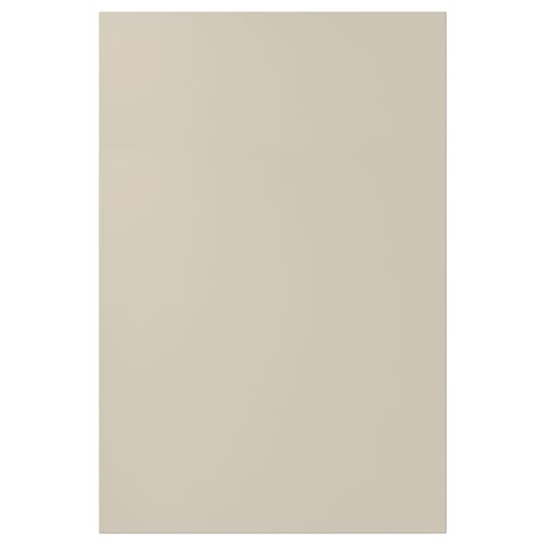 Een beige HAVSTORP keukenkastdeur. Het heeft gladde panelen en een modern ontwerp, gemaakt van acrylverf en vezelplaat.