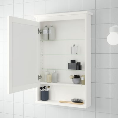 Witte HEMNES wandkast met spiegel, drie glazen planken. Geschikt voor toiletartikelen, make-up en borstels.
