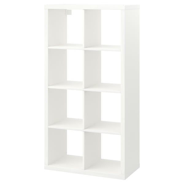 Witte KALLAX kubusvormige boekenkast met open vakken voor opslag.