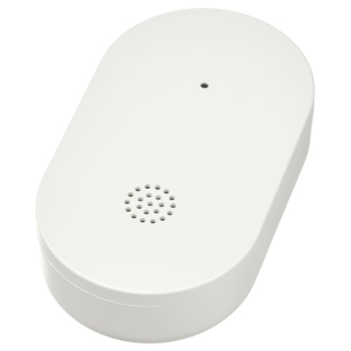 Een witte KLIPPBOK waterleksensor. Het is ovaal van vorm met een luidsprekerrooster, ontworpen om waterlekken te detecteren en gebruikers te waarschuwen.