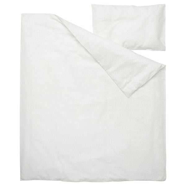 Witte baby beddengoed set: dekbed & kussen met subtiel stippenpatroon, zacht duurzaam geproduceerd katoen.
