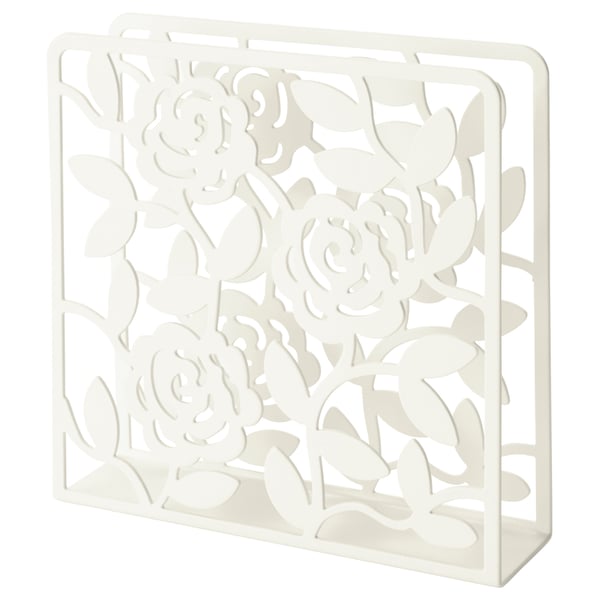 Een witte LIKSIDIG servethouder, gemaakt van staal en kunststof, met een decoratief bloemenmotief. Hij staat rechtop, klaar om servetten netjes vast te houden.