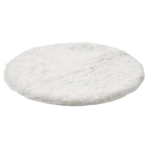 Wit, rond, donzig stoelkussen gemaakt van gerecycled polyester, blijft op zijn plaats aan de onderkant.