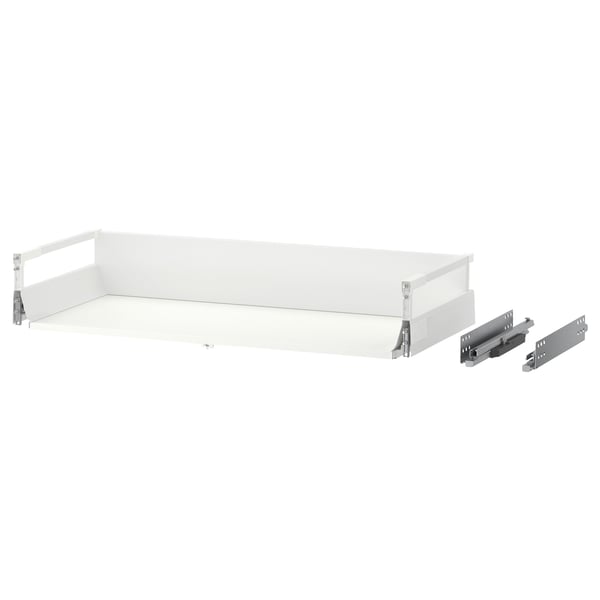 Een witte MAXIMERA lade met metalen geleiders en zijkanten.