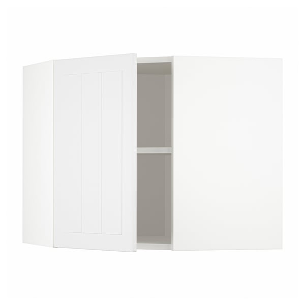 Een witte METOD hoekkeukenkast met een enkele verstelbare plank en een omkeerbare deur.