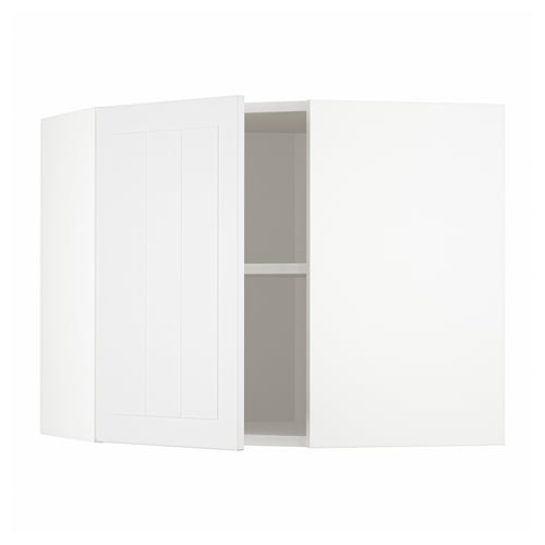 Een witte METOD hoekkeukenkast met een enkele verstelbare plank en een omkeerbare deur.