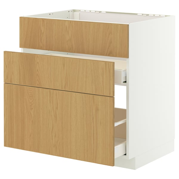 Houten witte kast met drie lades.
