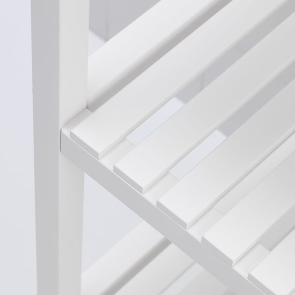 Modern wit rek, strakke lijnen, stevig design, meerdere vakken.