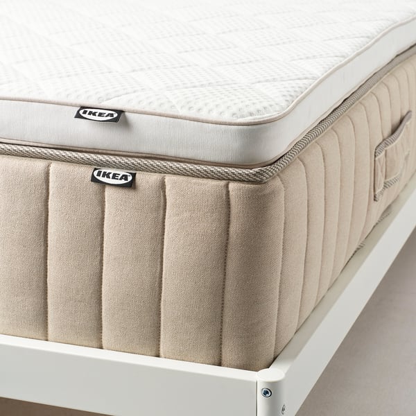 IKEA NYLÄGET matrasbeschermer met latex voor temperatuurregeling en ondersteuning. Wasbare hoes, zorgt voor comfort en hygiëne.