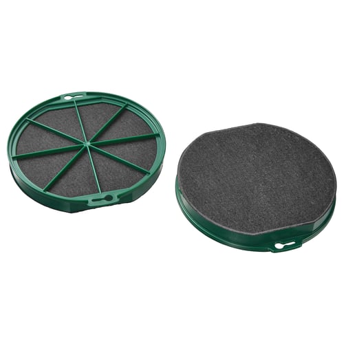 Twee ronde groene koolstoffilters, waarvan één verdeeld in secties.