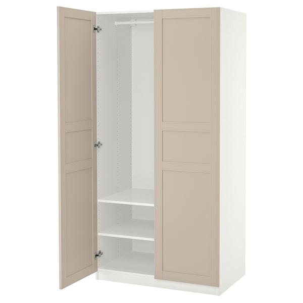 PAX kledingkast, beige. Modern, hoog, rechthoekig. Zachtsluitende scharnieren, twee deuren, planken aan de binnenkant.