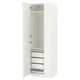 Witte ikea PAX kledingkast met lades en planken.