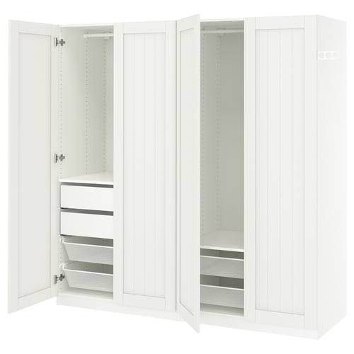Witte PAX kledingkast met gaasmanden en planken.