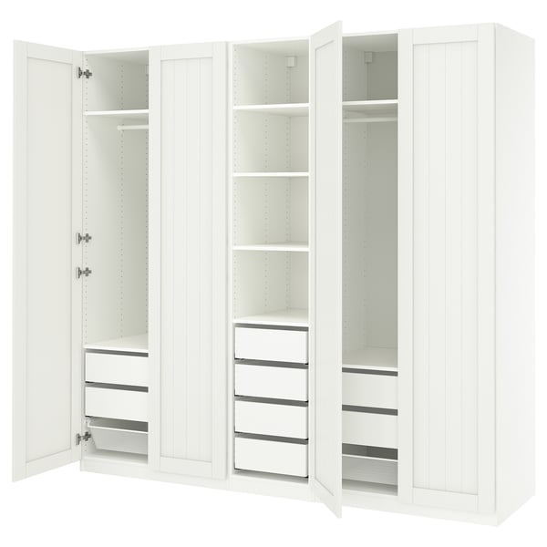 Witte PAX kledingkast, 3-delig. Planken, laden, rails. Modern, verticaal betimmerd.