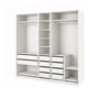 Witte ikea PAX kledingkast met lades en planken, modern minimalistisch design.