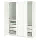 Witte PAX kledingkast met open deuren, meerdere lades en planken. Modern design met strakke randen.