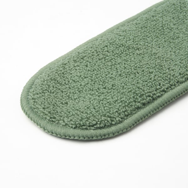 Groene microvezeldoek, netjes gestikt, om af te stoffen.