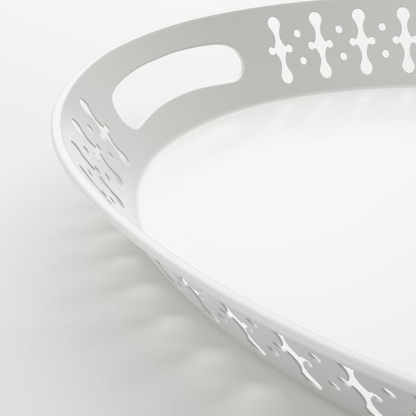 Ronde witte lade met uitgesneden handgrepen.