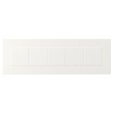 STENSUND witte kasten met ingelijste, gegroefde panelen.