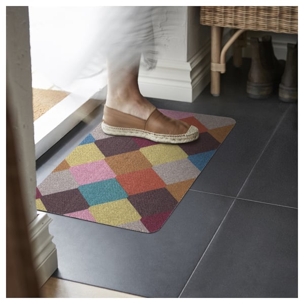 Kleurrijke geometrische deurmat met in elkaar grijpende vormen & antislip achterkant