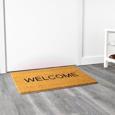 Welkomstmat met welkomsttekst, antislip achterkant, voor gebruik binnenshuis.