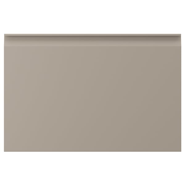 UPPLÖV beige keukenkast met strakke randen en geïntegreerde handgrepen.