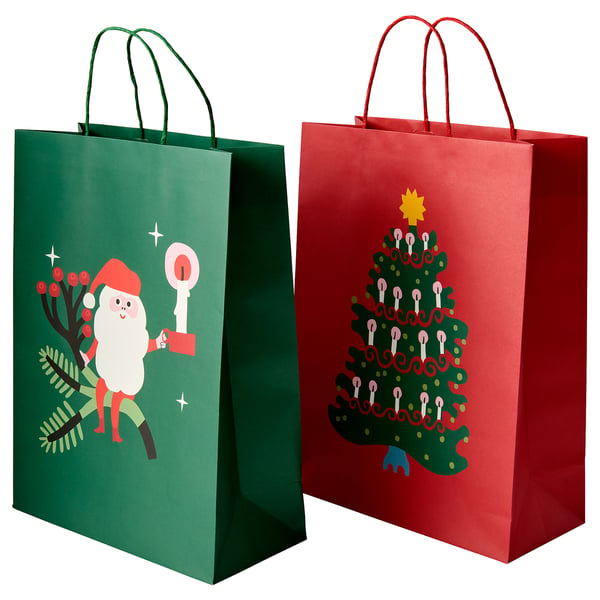 Twee feestdagenzakjes: één groen met de kerstman, één rood met een kerstboom.