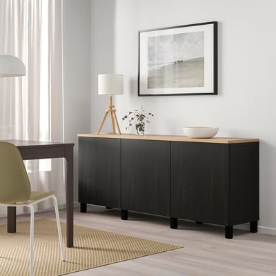 BESTÅ black sideboard with light top, adjustable shelves, and soft-close. Includes small table and lime chair.