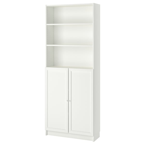 White BILLY bookcase with open and closed storage.