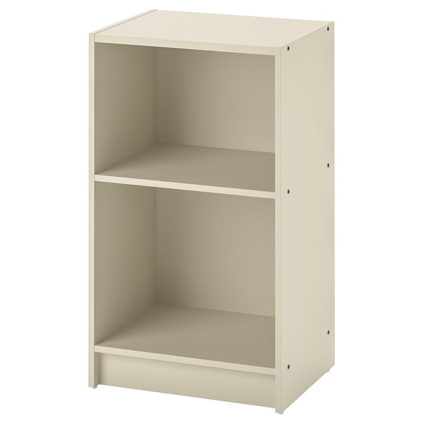 A GURSKEN beige bedside table with two open shelves, made of particleboard and acrylic paint, featuring a clean and simple design.