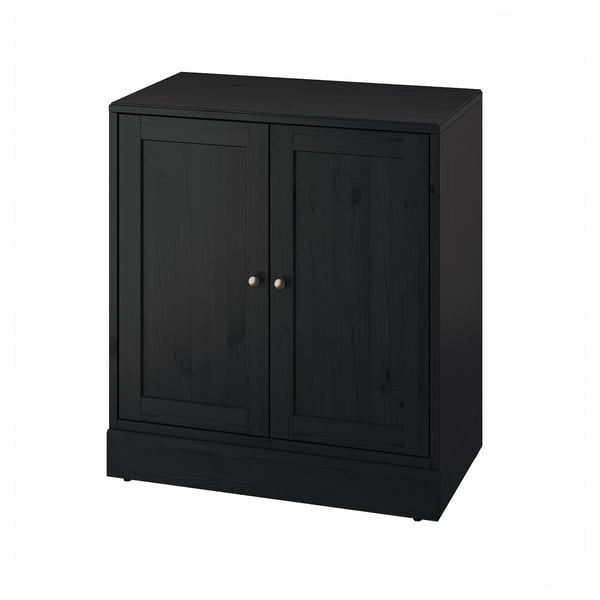 A black HAVSTA wooden cabinet with two doors, simple design, and a sturdy structure made from solid pine.