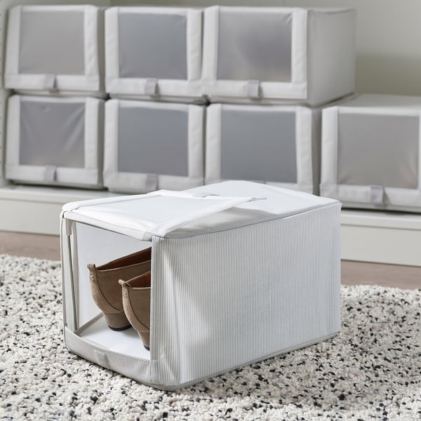 Clear shoe box with 2 pairs of shoes inside, front opening, part of stackable HEMMAFIXARE series for organised storage.