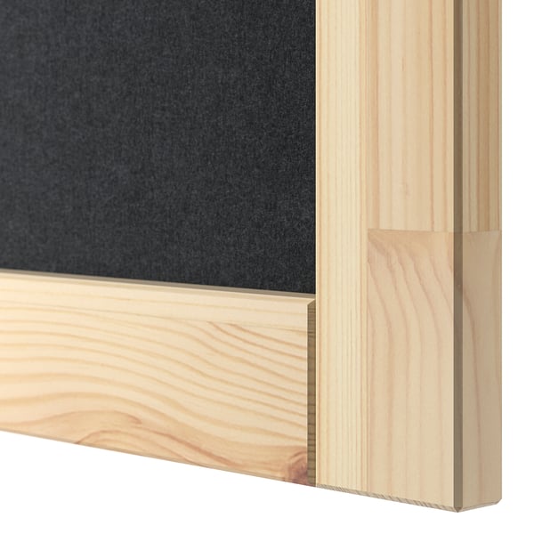 A close-up of IVARs wooden frame, highlighting the smooth, natural pine texture and sturdy construction.