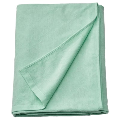 Light green JÄTTETUJA blanket, folded, lightweight with smooth texture.