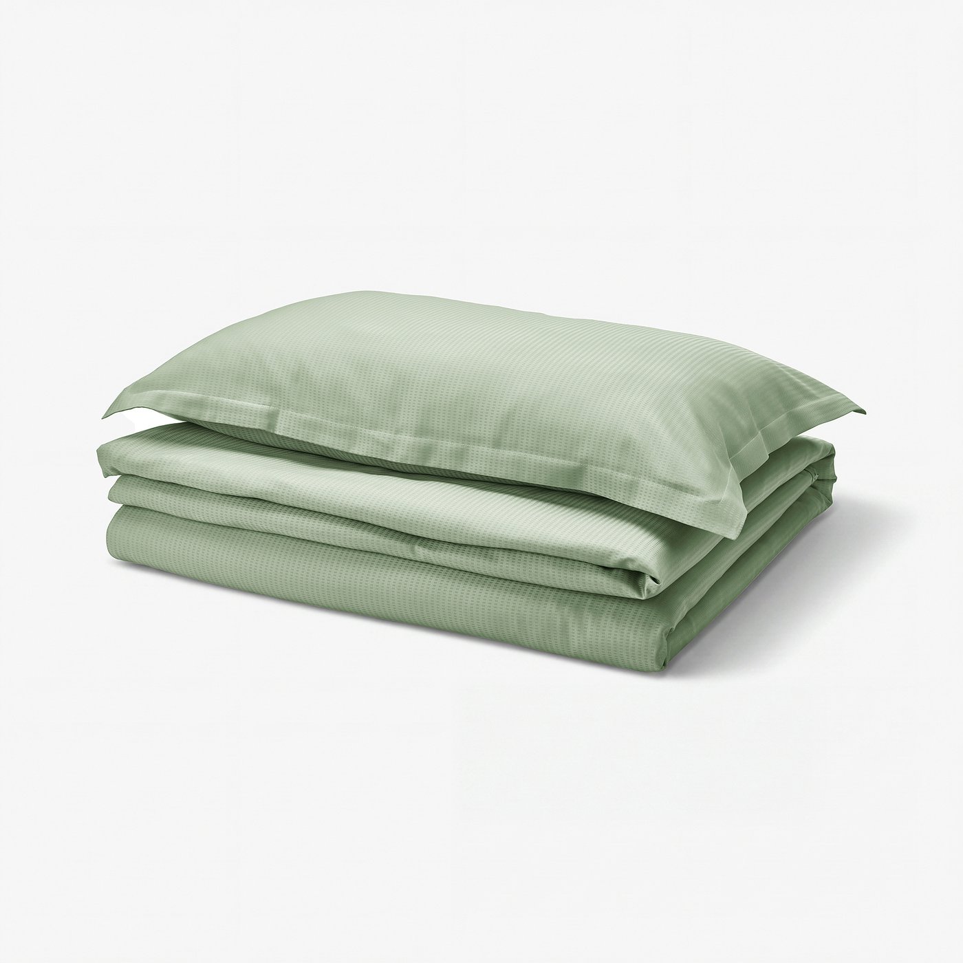 Green LÄKEVÄNDEROT bedding set, featuring a smooth, textured duvet and pillowcases with flange, neatly folded.