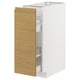 White METOD cabinet with oak door, minimalist warmth, pull-out shelves.