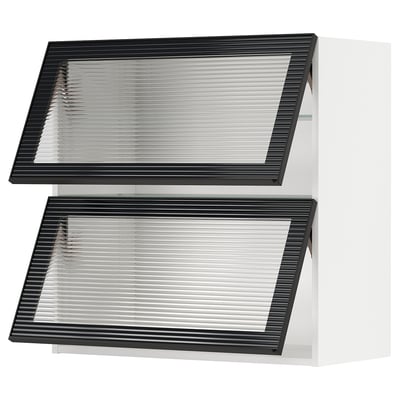 Modern kitchen cabinets with glass doors, sleek black frames, and reeded glass panels, arranged in a modular style.