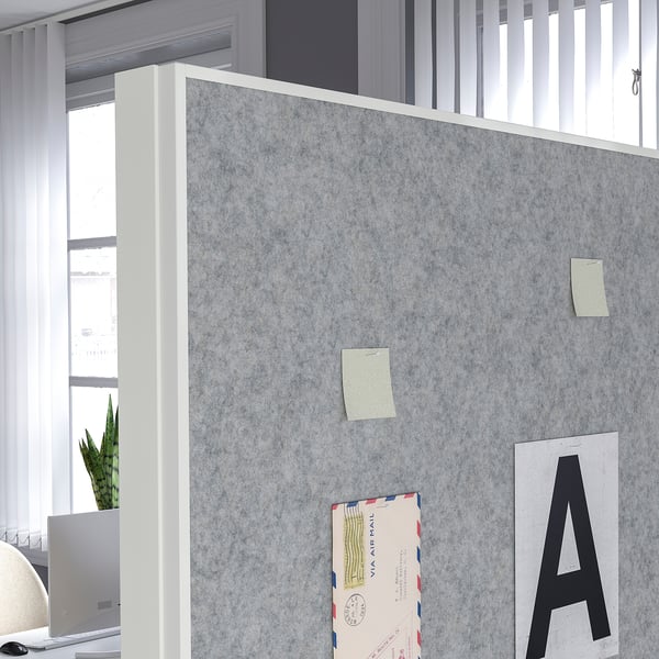 A mobile whiteboard/notice board with wheels, suited for offices. Locking castors keep it stable. Perfect for workshops or presentations.