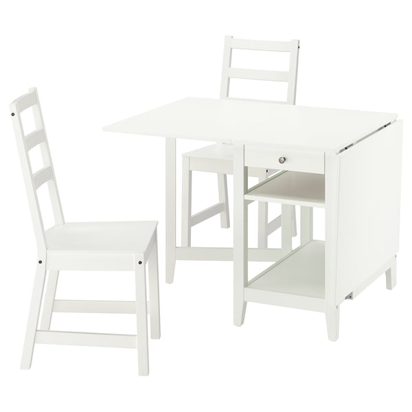 White NÄSINGE drop-leaf table with 2 chairs, foldable sides, storage, and ladder-back design.