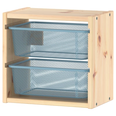 A light wood TROFAST wall storage unit with blue mesh bins for organising items.